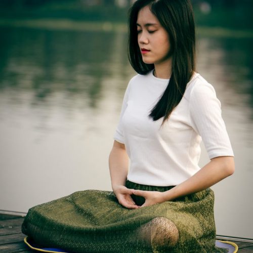 Young girl meditatng
